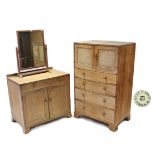 A HEAL’S OF LONDON LIMED OAK FOUR-PIECE BEDROOM SUITE, comprising a millinery cupboard, 30” wide;