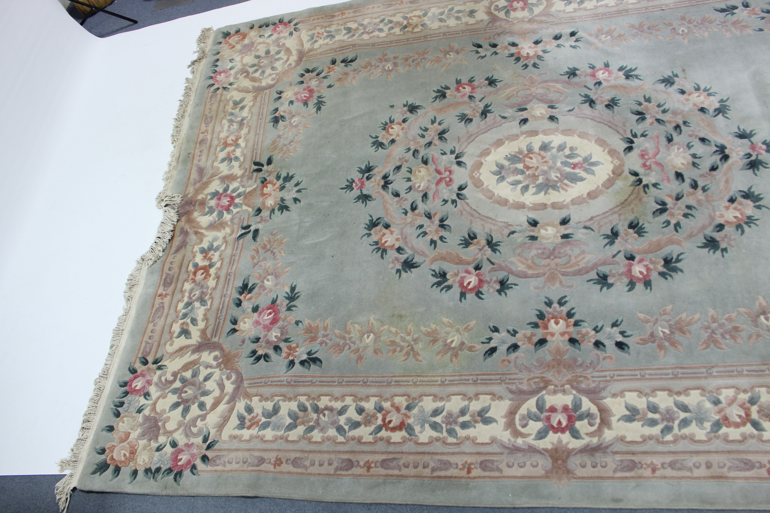 A Chinese carpet of pale green & ivory ground, with all-over floral design to centre within a wide - Image 2 of 5