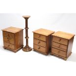 Three pine three-drawer bedside chests; & a torchere.