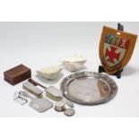*PLEASE NOTE* A silver four-division toast rack; five silver dressing table items; a plated