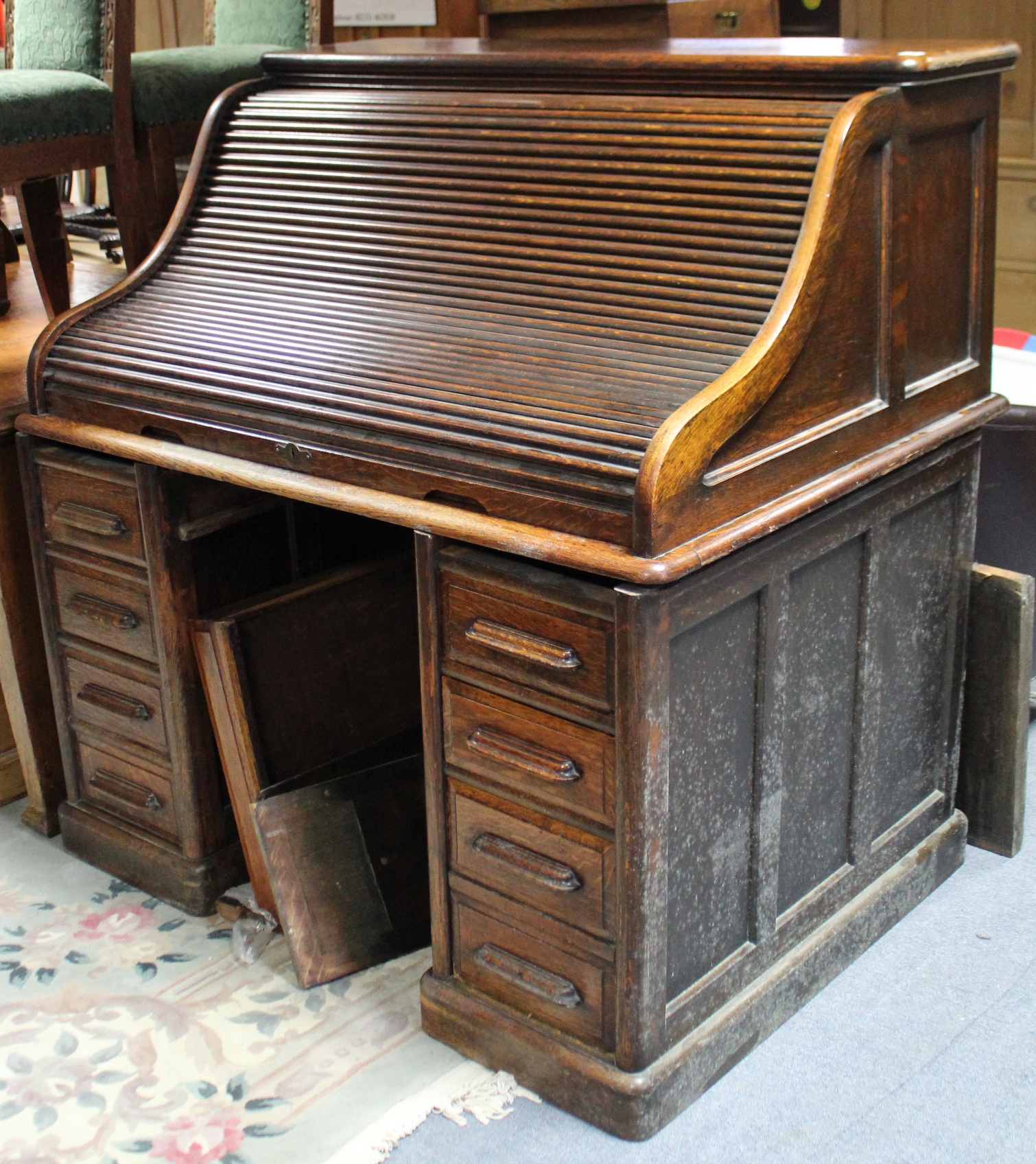 A late 19th/early 20th century oak roll-top pedestal desk with fitted interior enclosed by tambour - Image 2 of 4