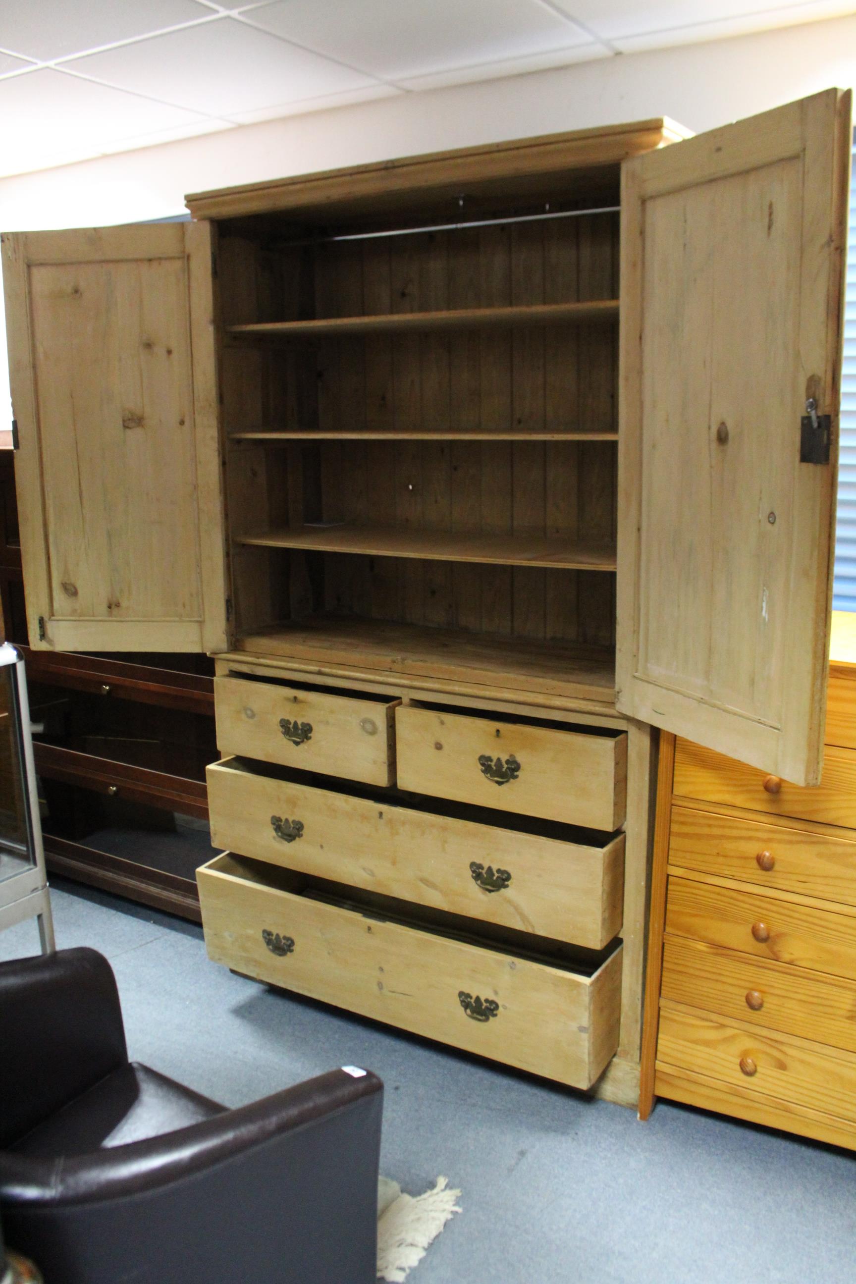 A VICTORIAN PINE LINEN PRESS, the upper part fitted three shelves enclosed by pair of panel doors, - Image 2 of 2