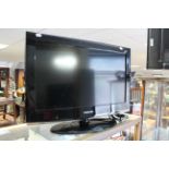 A Samsung 26” HD-Ready TV in black-finish case.