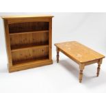A pine small standing three-tier open bookcase on plinth base, 38” wide x 42½” high; & a pine