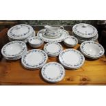 A Royal Doulton china “Burgundy” pattern forty-nine piece dinner service.