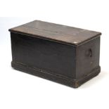 An early 20th century painted deal blanket box with hinged lift-lid, wrought-iron side handles, & on