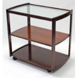 A mahogany-finish rectangular three-tier tea trolley, 32¼” wide.