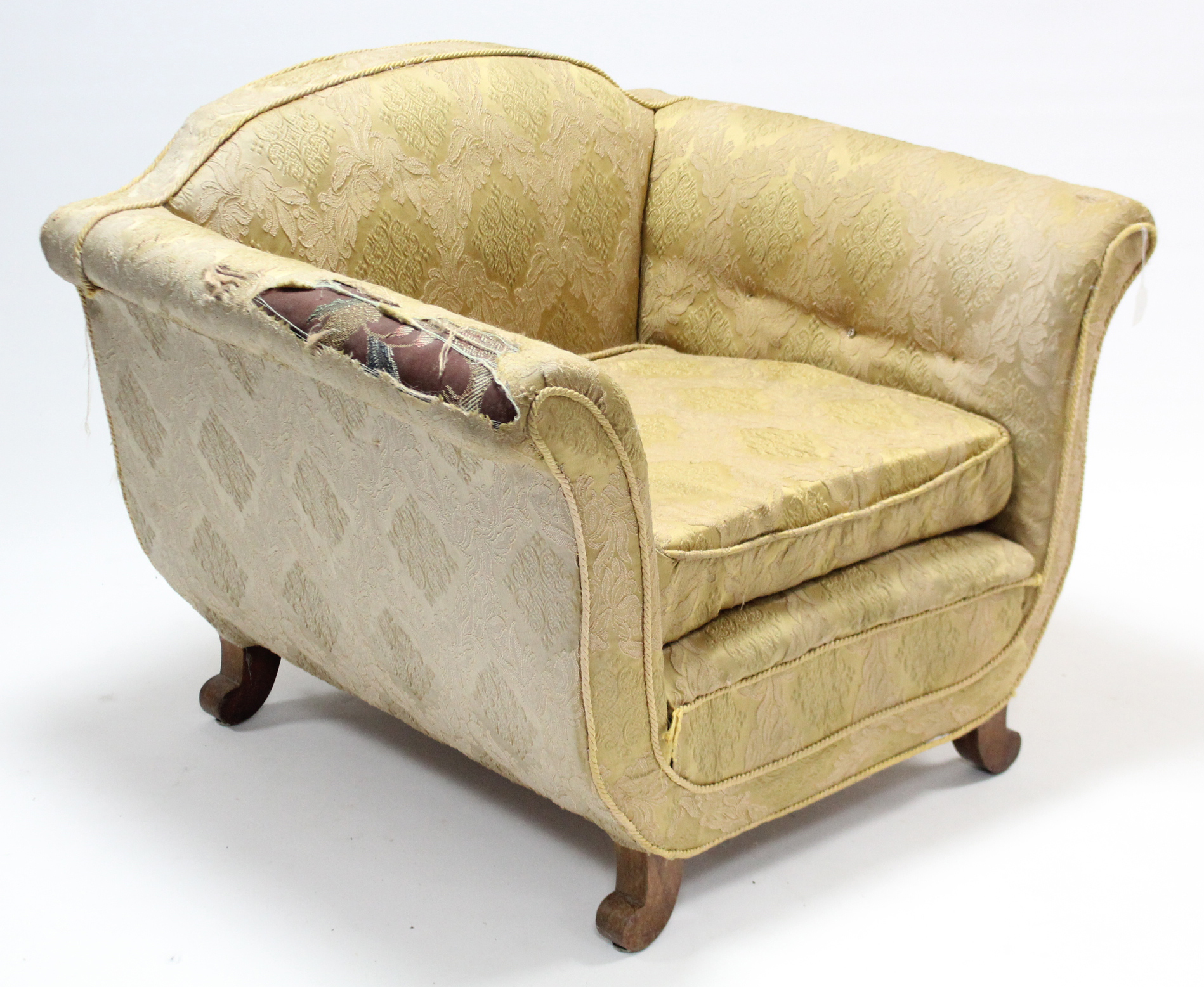 An art deco-style armchair (requires reupholstering).