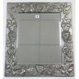 A pewter frame rectangular wall mirror inset bevelled plate, 26¾” x 23½”; together with two other