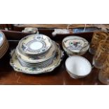 A late Victorian floral decorated part tea service; two floral decorated part dinner services; &