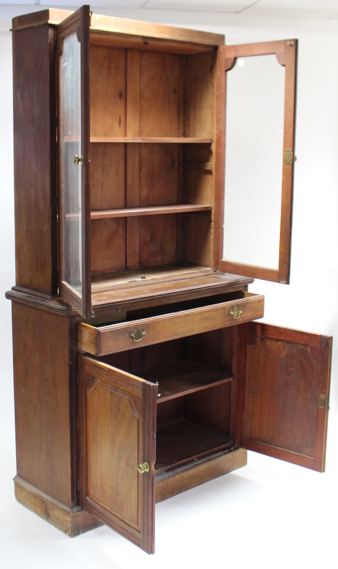 A late Victorian mahogany tall bookcase, the upper part with two adjustable shelves enclosed by pair - Image 2 of 2