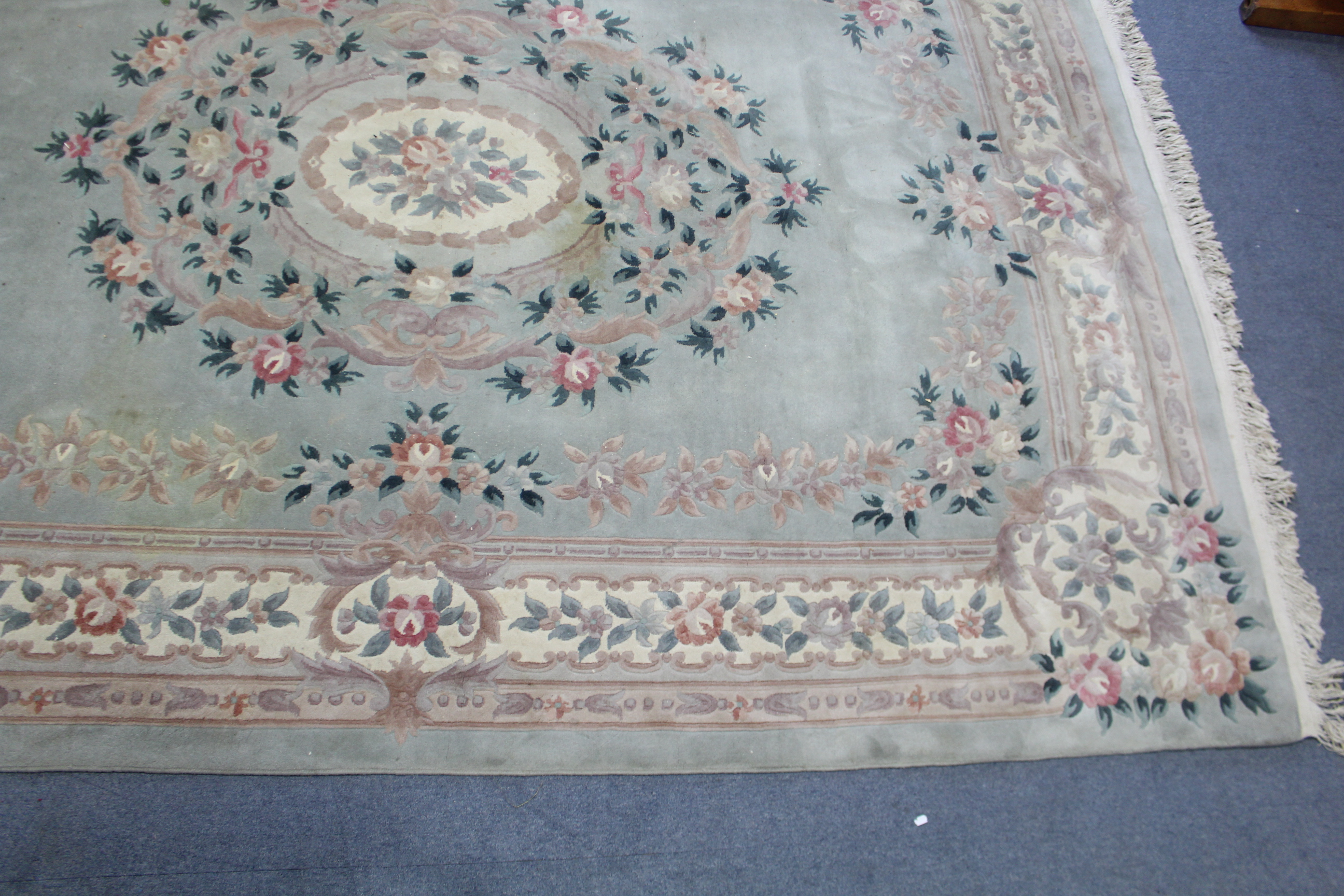 A Chinese carpet of pale green & ivory ground, with all-over floral design to centre within a wide - Image 4 of 5