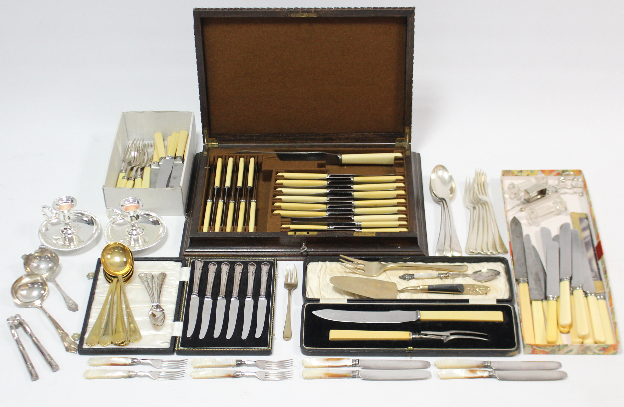 Various items of plated & stainless steel cutlery; together with a pair of plated dwarf