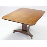 A 19th century mahogany breakfast table with plain rectangular tilt-top, on triform base with