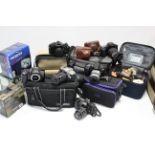 Approximately fifty various cameras by Canon, Minolta, Olympus, etc., & various camera accessories.