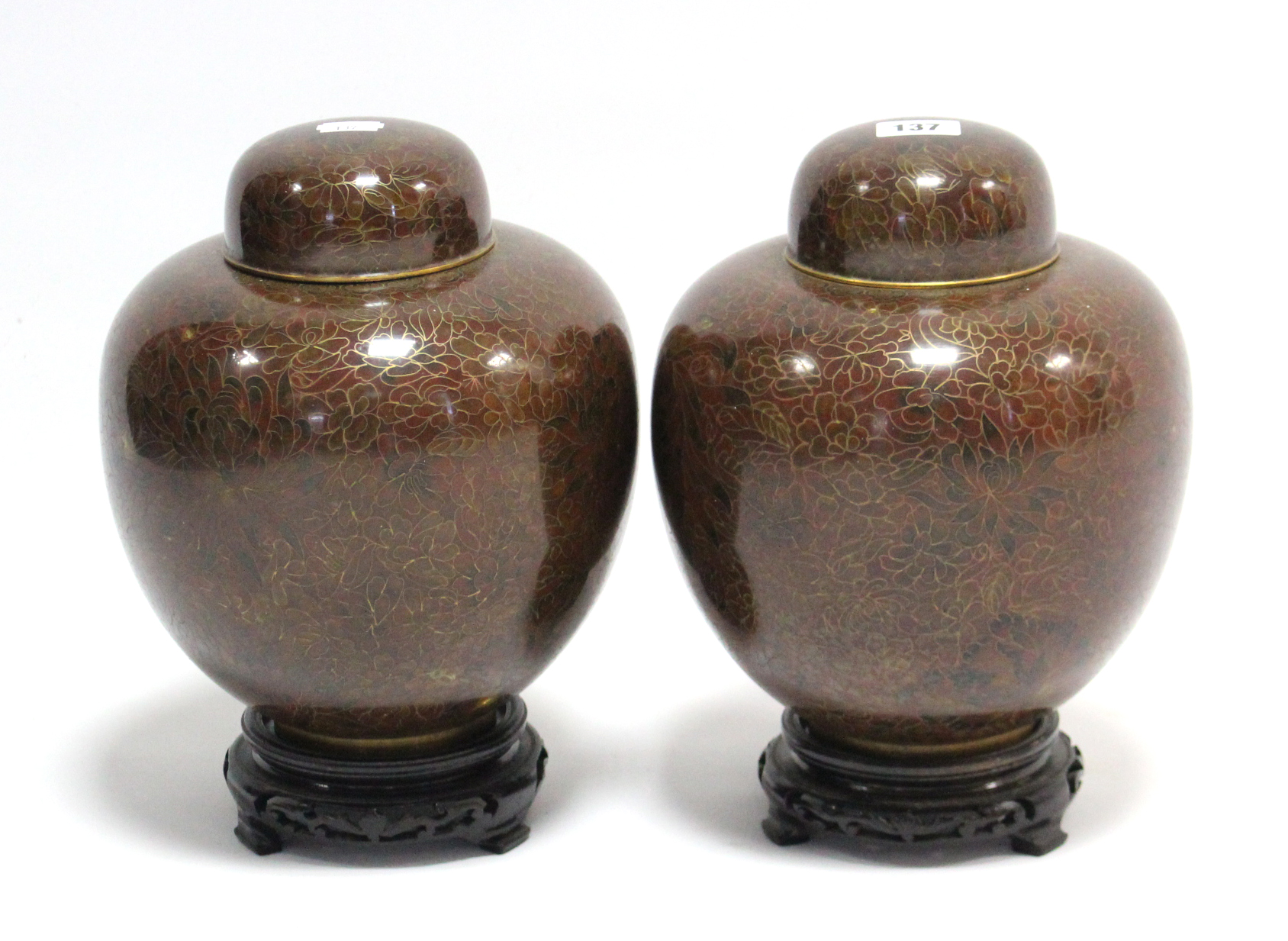 A pair of Chinese cloisonné ovoid vases of bronze ground with removable covers & each with