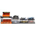Six Scalextric model racing cars, all boxed; & various other Scalextric accessories.