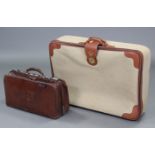 A Fortnum & Mason brown leather & khaki canvas large suitcase; & a brown leather Gladstone-type