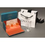 A set of three Lalique glass perfume bottles, cased; & a ditto paperweight.