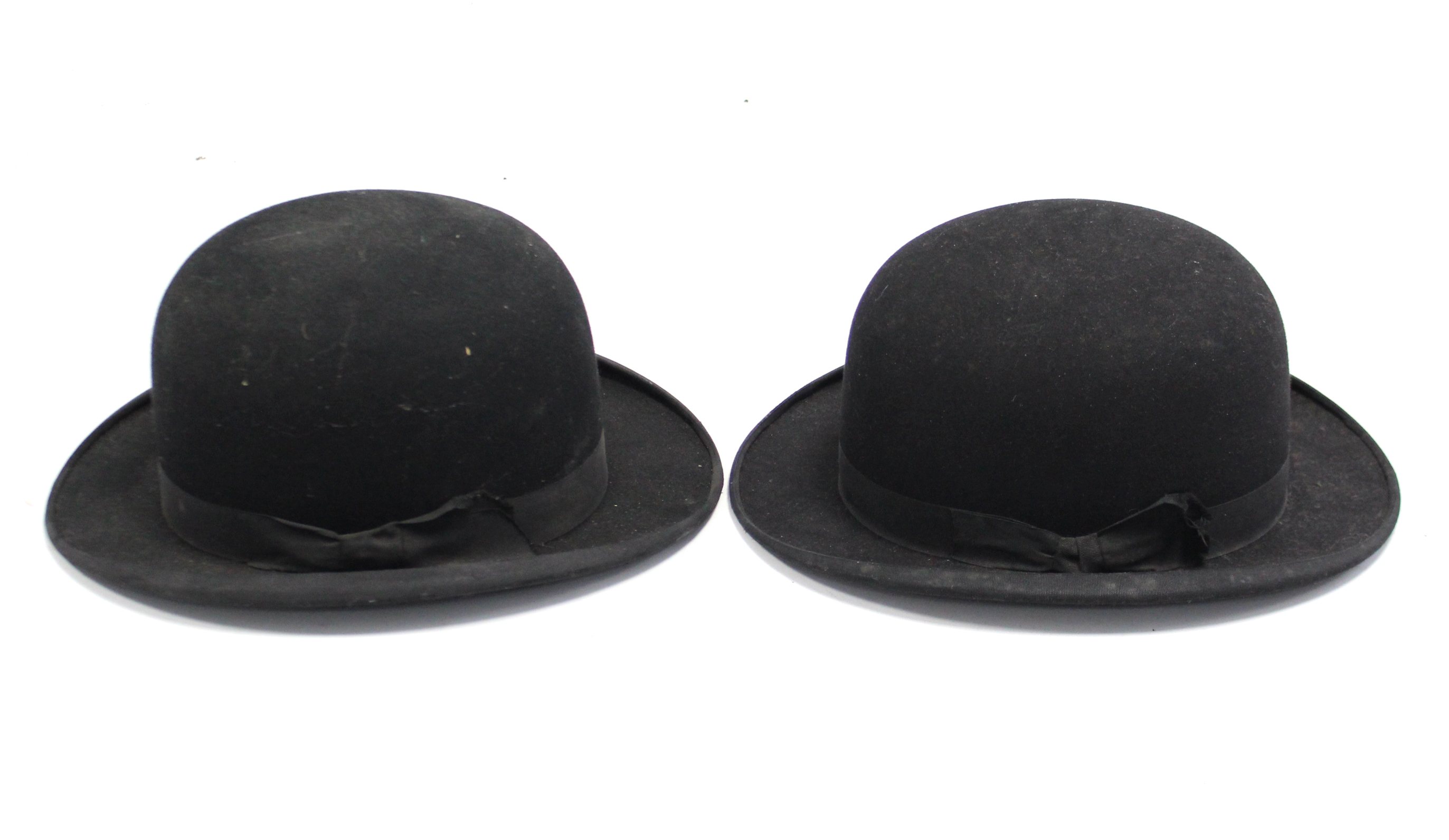 A Christy’s of London black felt bowler hat; & a Dunn & Co. of London ditto.