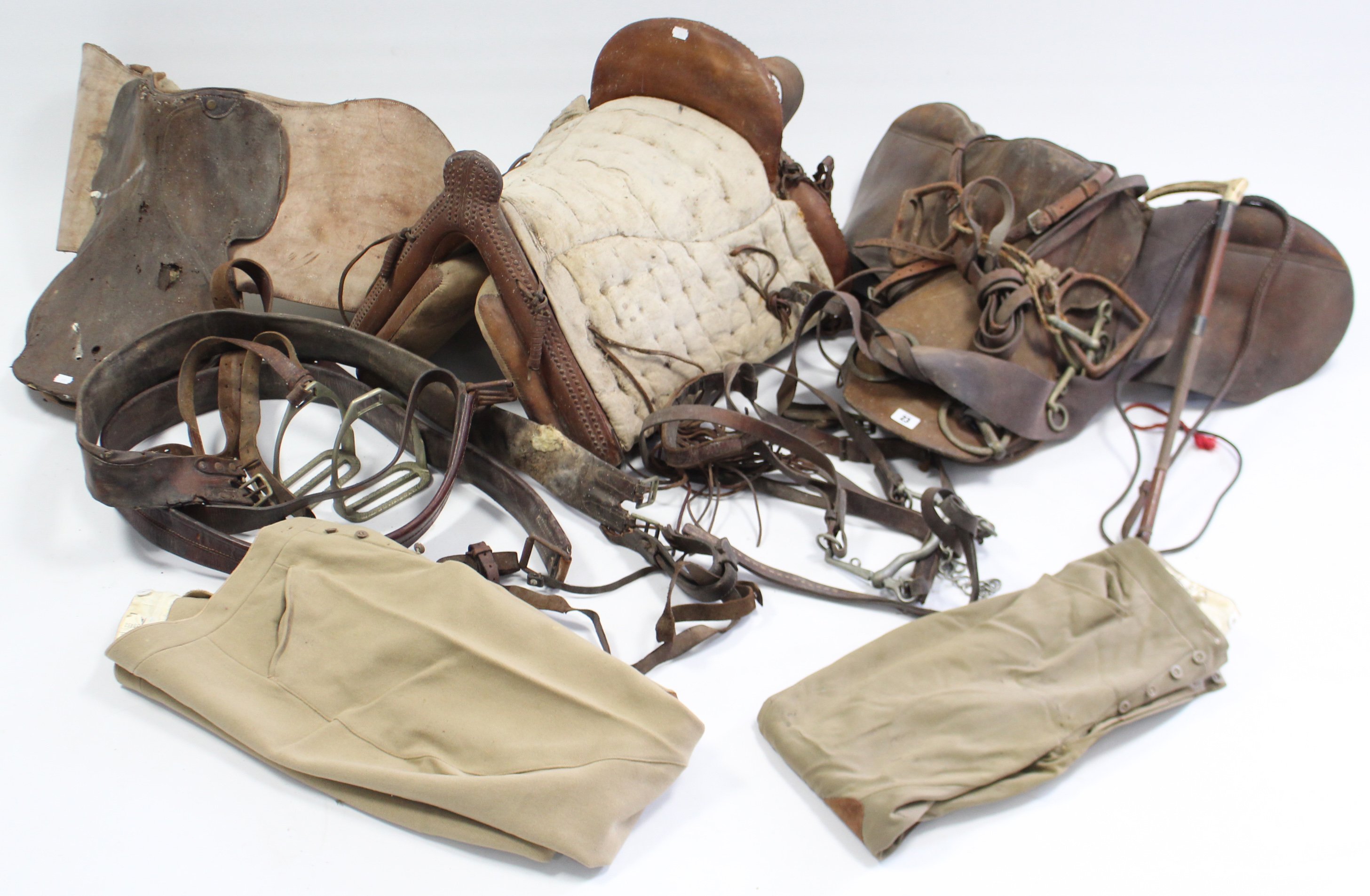 Three leather horse riding saddles; two pairs of riding breeches; a woven horse-hair riding crop; - Image 2 of 23