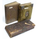 Three Victorian leather-bound family photograph albums containing a total of two hundred various