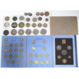 A small collection of British coins, commemorative crowns, three £5 coins, etc.