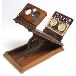 A Rounsell’s “Graphoscope” table stereoscope card viewer; & approximately thirty various stereo card