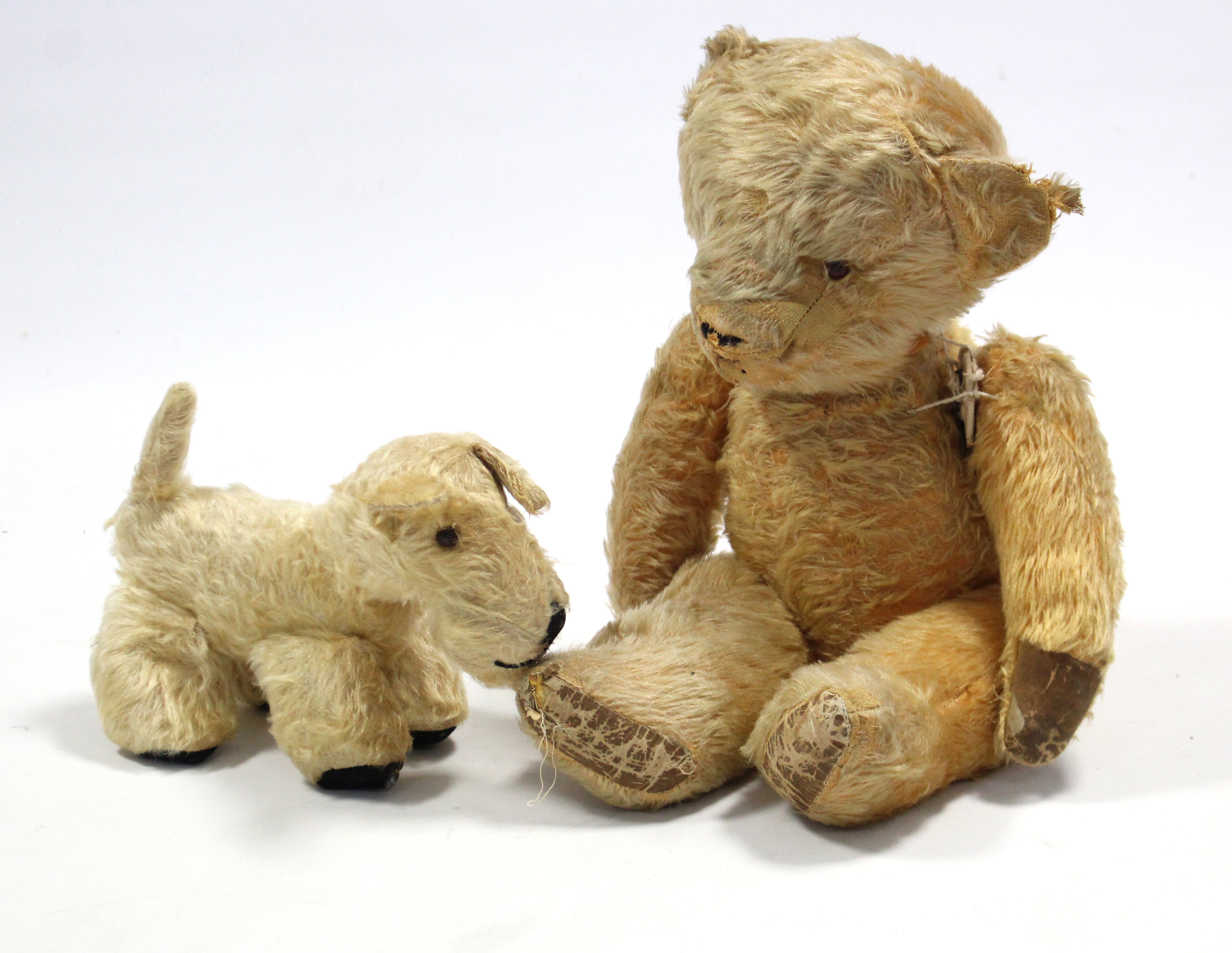 A Deans Rag Book terrier soft toy; a golden plush teddy bear, 20” tall, w.a.f.; & a silk-lined fur