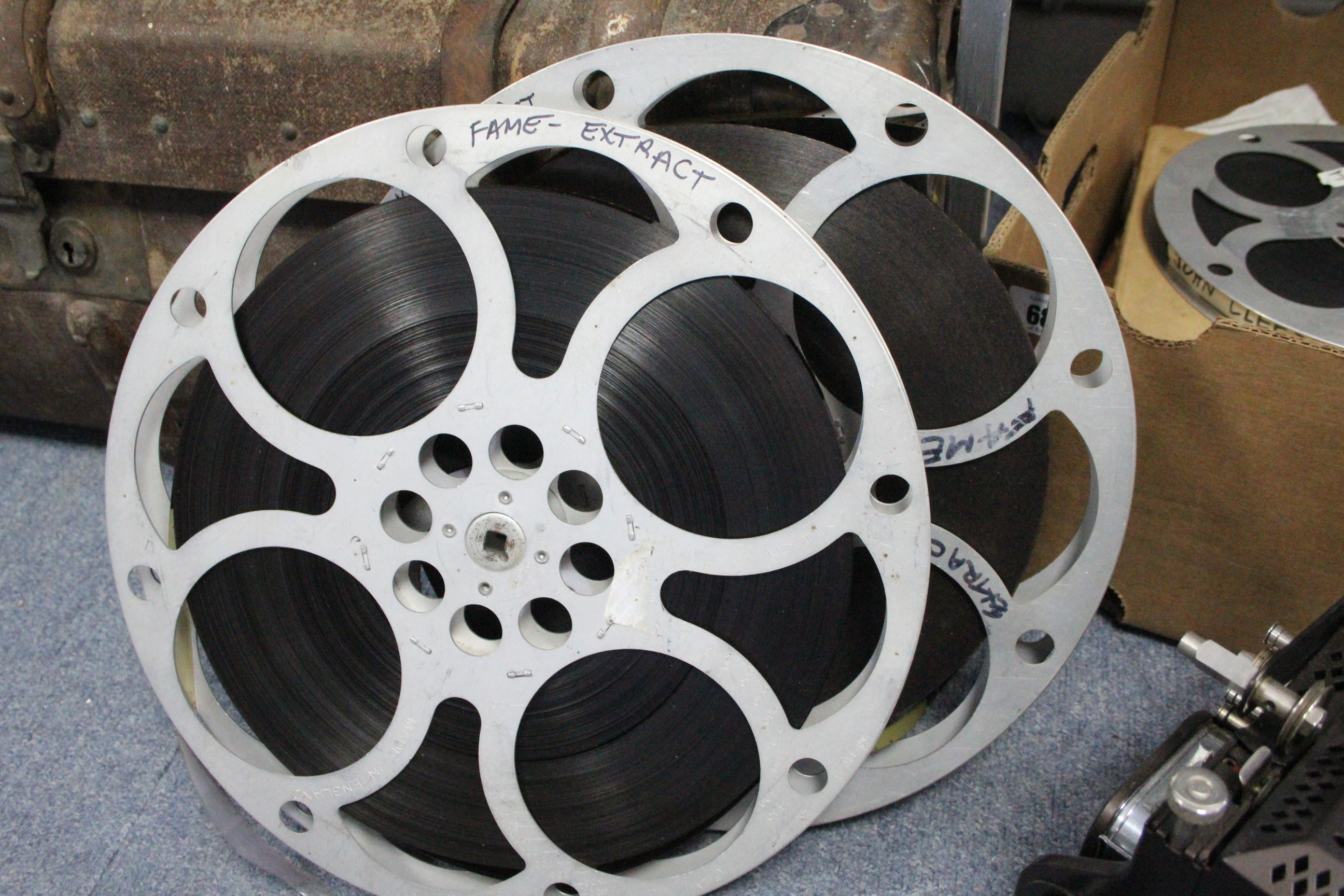 A collection of 16mm film reels; a film projector; & a film editor. - Image 9 of 11