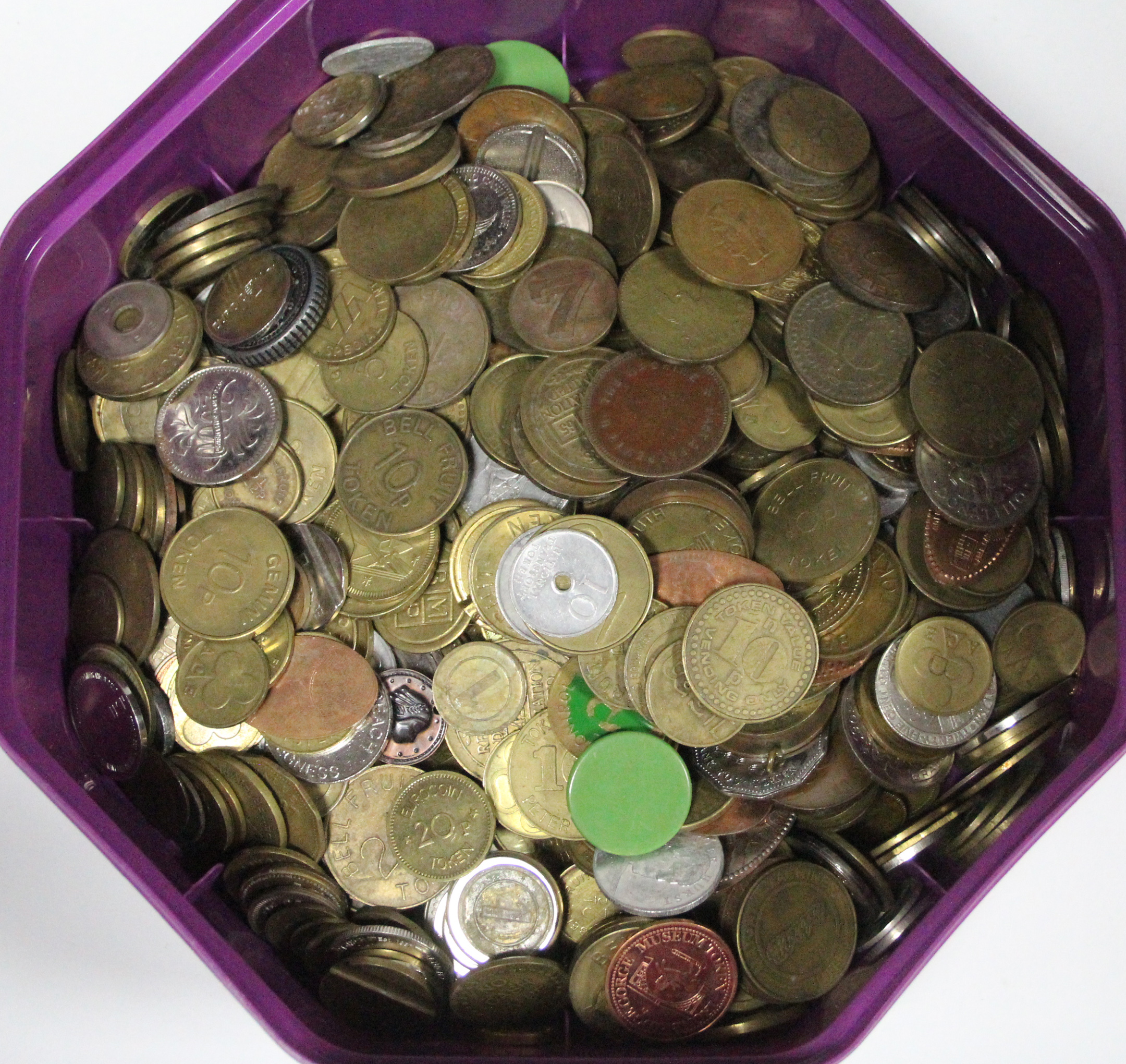 A large collection of various tokens.