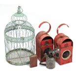A pale green painted wirework birdcage; two railway lanterns; a small leather-bound volume; a blow-