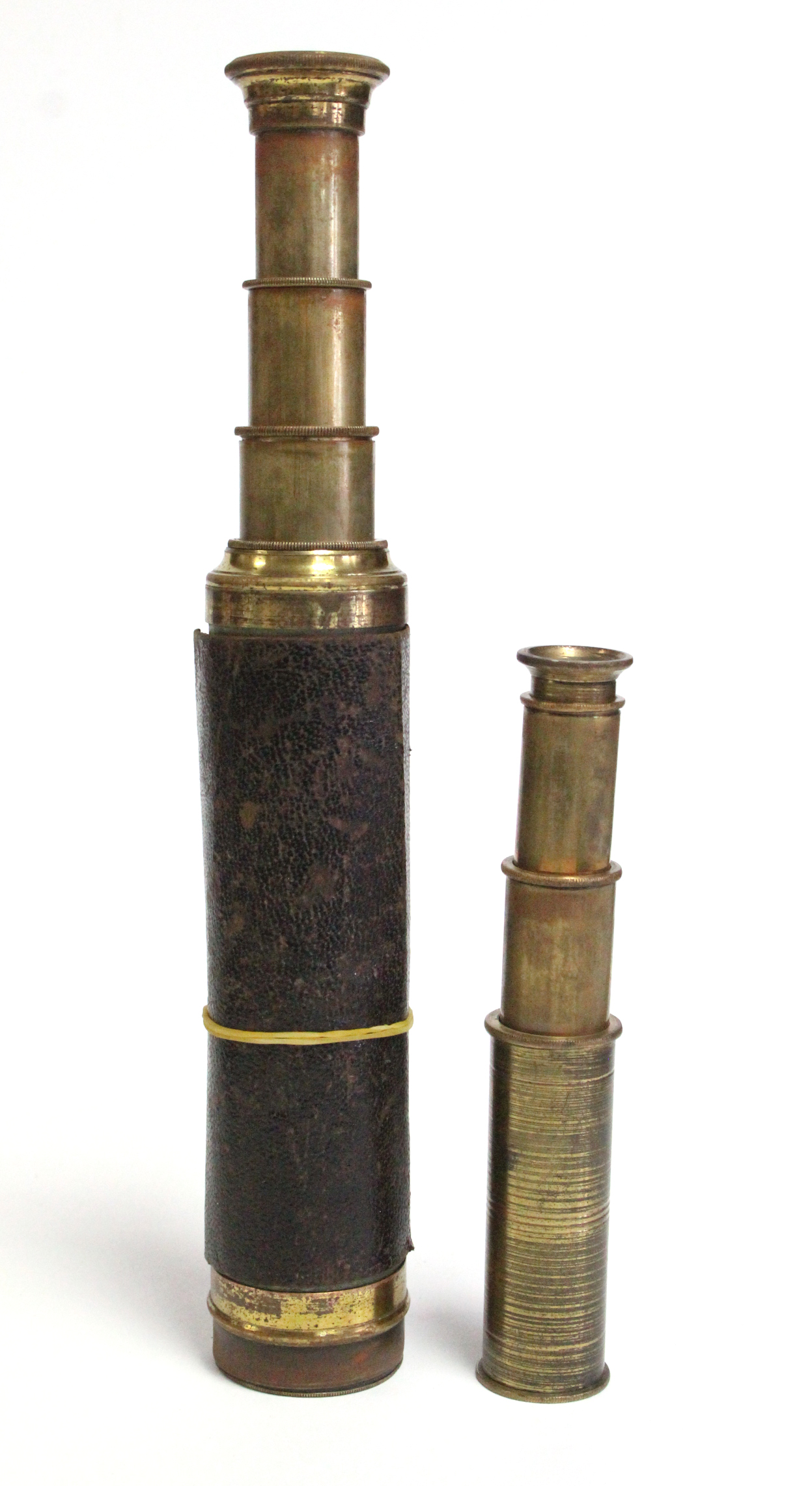 Two brass three-drawer pocket telescope, 18½” & 6½” long.