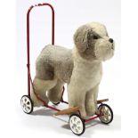 A mid-20th century Pedigree soft toys “dog” baby walker.