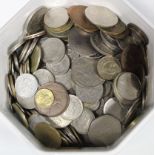 A quantity of mixed foreign coins.