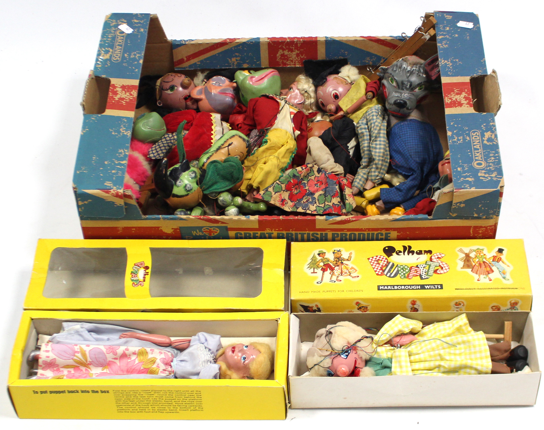 Thirteen Pelham string puppets (two boxed).