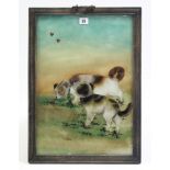 A late 19th/early 20th century Chinese reverse painting on glass, depicting two dogs, 19¼” x 13¼”,