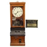 A National Time Recorder Co. National Electric” factory clocking-in machine with 9” diam. white