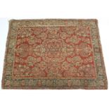 An antique French crewel-work tapestry of multi-coloured ground & with all-over repeating floral
