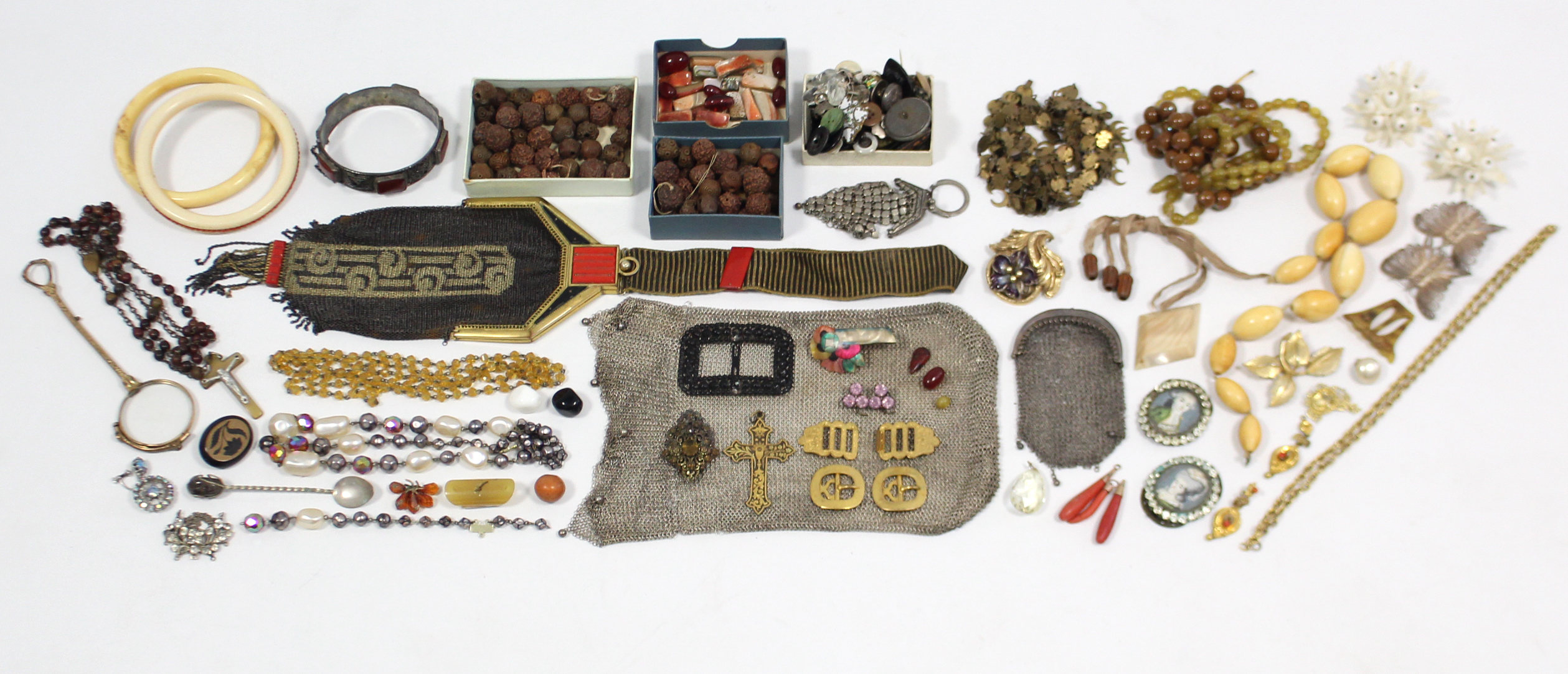 A pair of yellow-metal lorgnettes; four small meshwork purses; & various items of costume