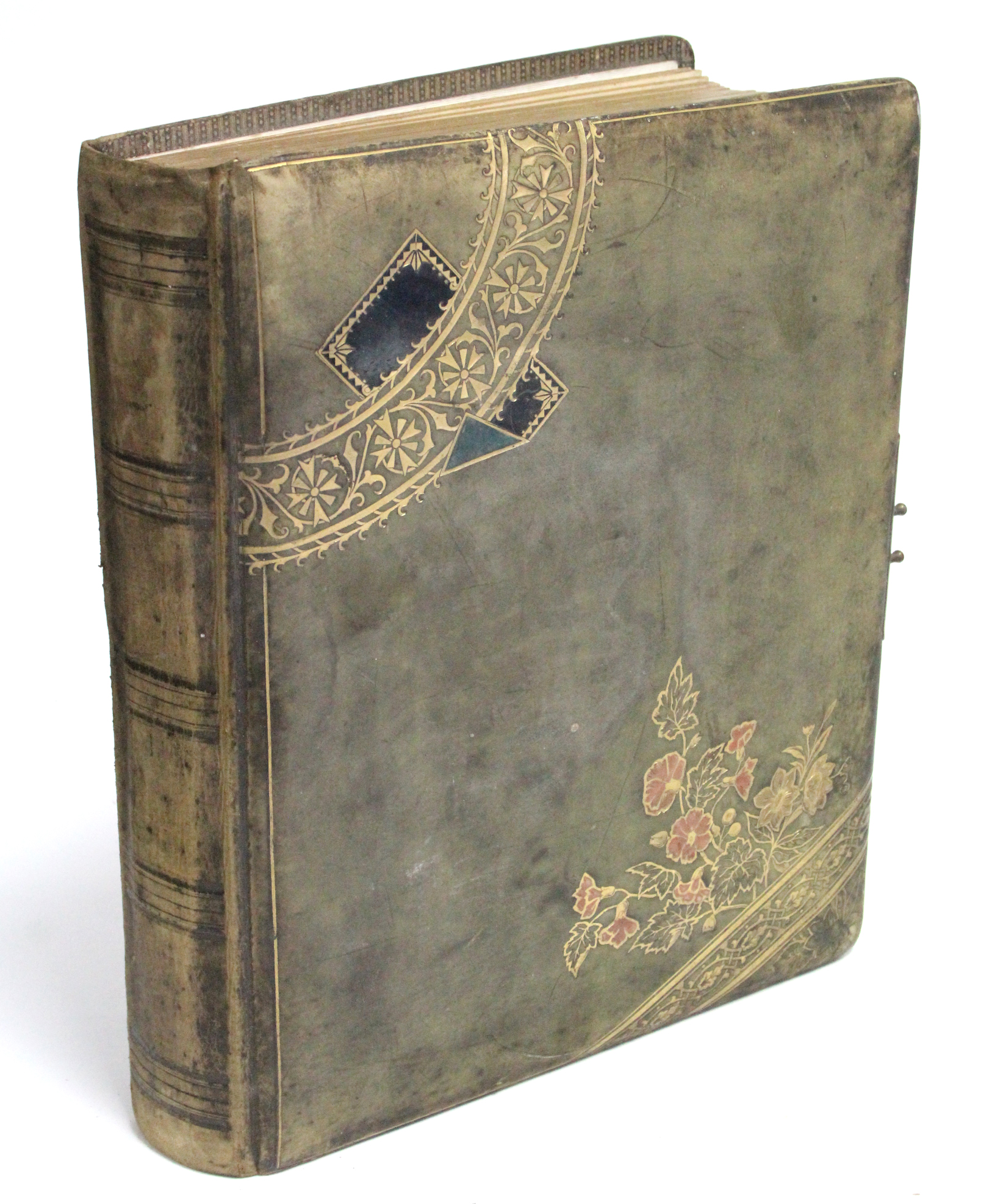 A Victorian leather-bound family photograph album containing seventy various black & white