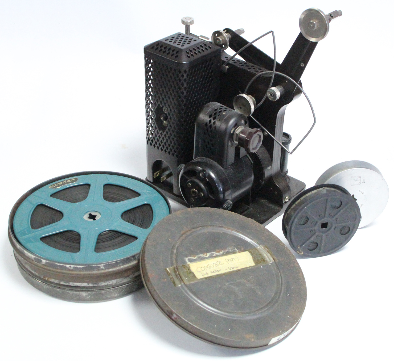 A collection of 16mm film reels; a film projector; & a film editor.