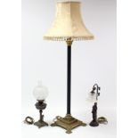 A brass & black-finish metal Corinthian-style standard lamp; together with a table lamp; an oil