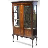 A 19th century inlaid-mahogany tall china display cabinet, fitted three shelves enclosed by pair