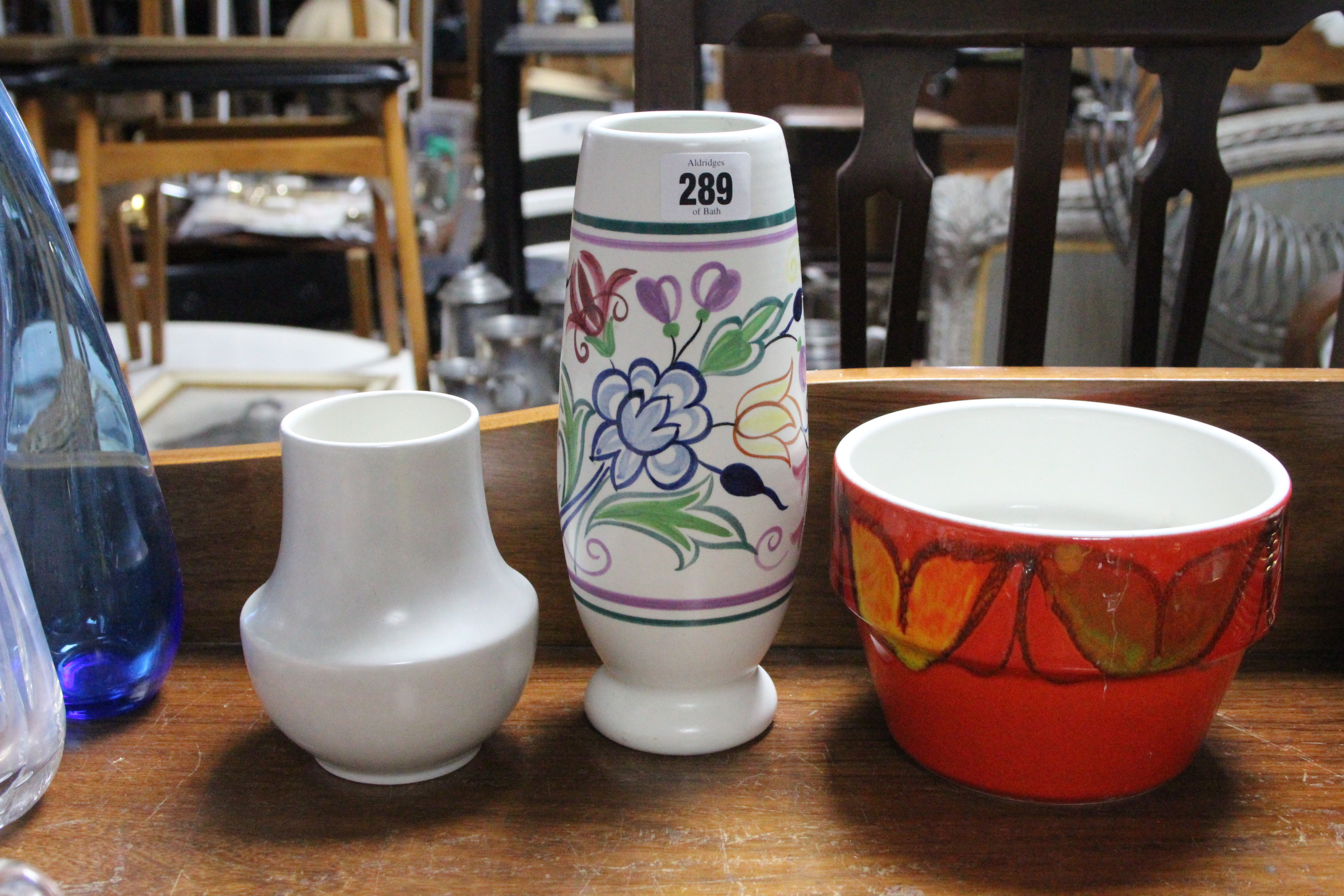 Three Poole pottery vases; & various other items of decorative pottery & glassware, part w.a.f.