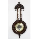 An aneroid wall barometer in carved walnut banjo-style case, 22” high; together with nine various