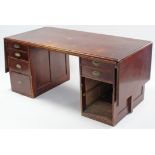 A yew wood pedestal desk fitted with an arrangement of drawers & cupboards, 62” x 30”.