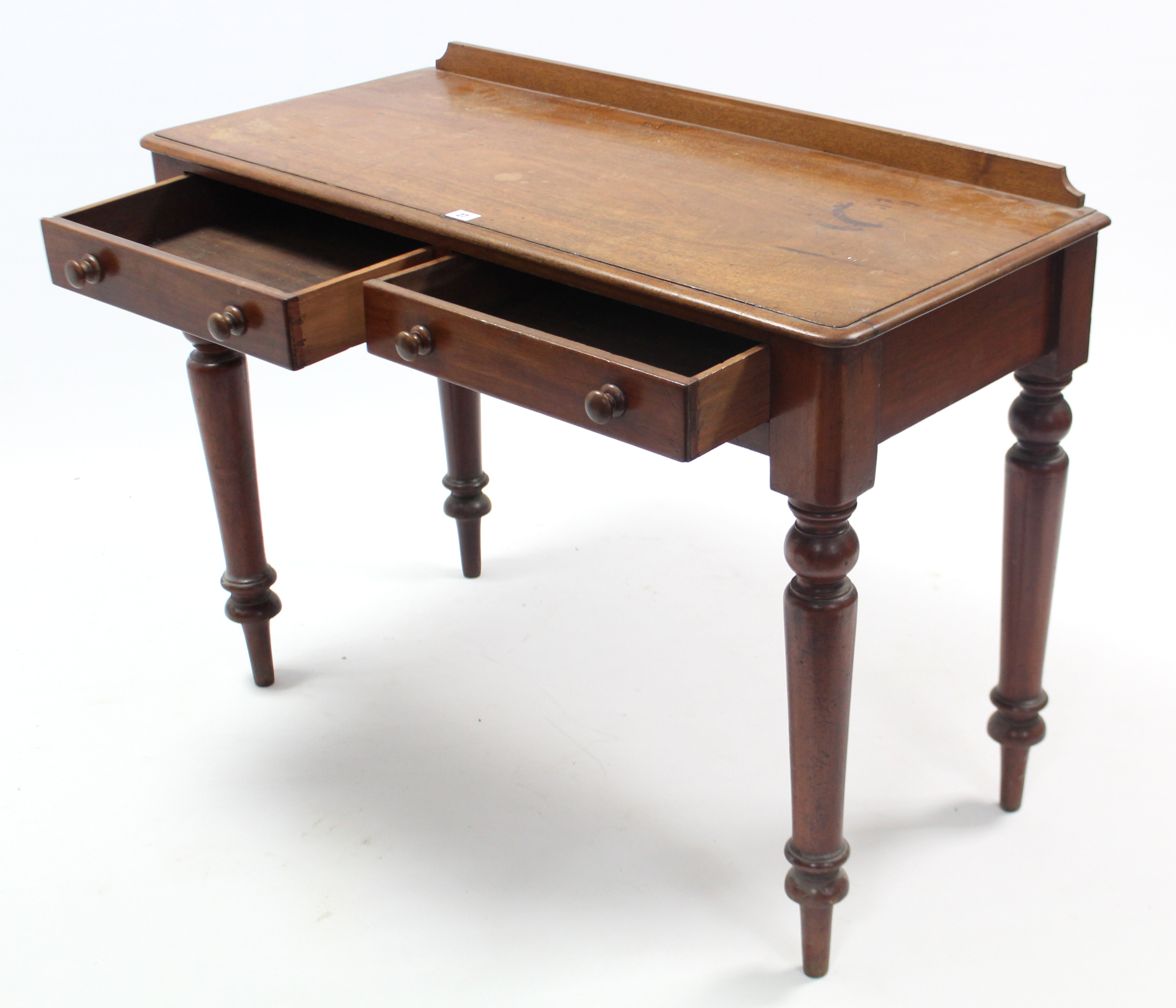 A Victorian mahogany side table fitted two frieze drawers, & on turned tapered legs, 40½” wide. - Image 2 of 3