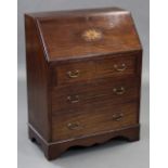 An Edwardian inlaid-mahogany small bureau, the sloping fall-front enclosing tooled leather writing