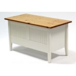 An Ikea “Visdalen” pine & white-finish blanket box with hinged lift-lid, 39¾” wide.